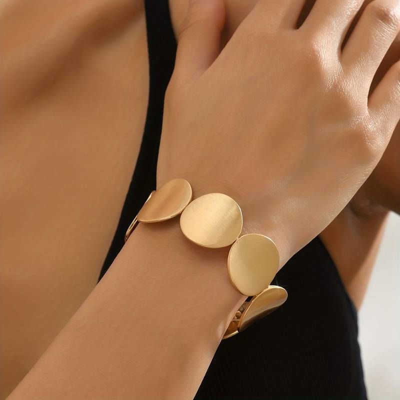 Thumbnail: Bangle Macy zwart en goud | brede armbanden
