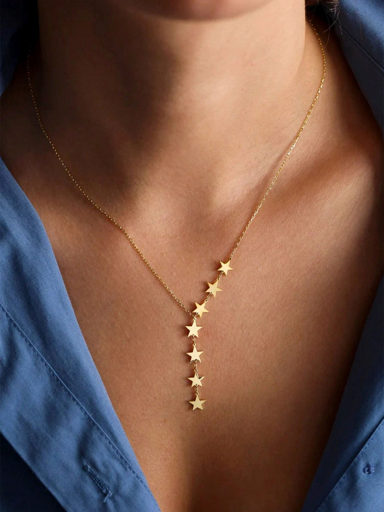 y kettinkje met sterren rvs goud van world's Finest modelfoto