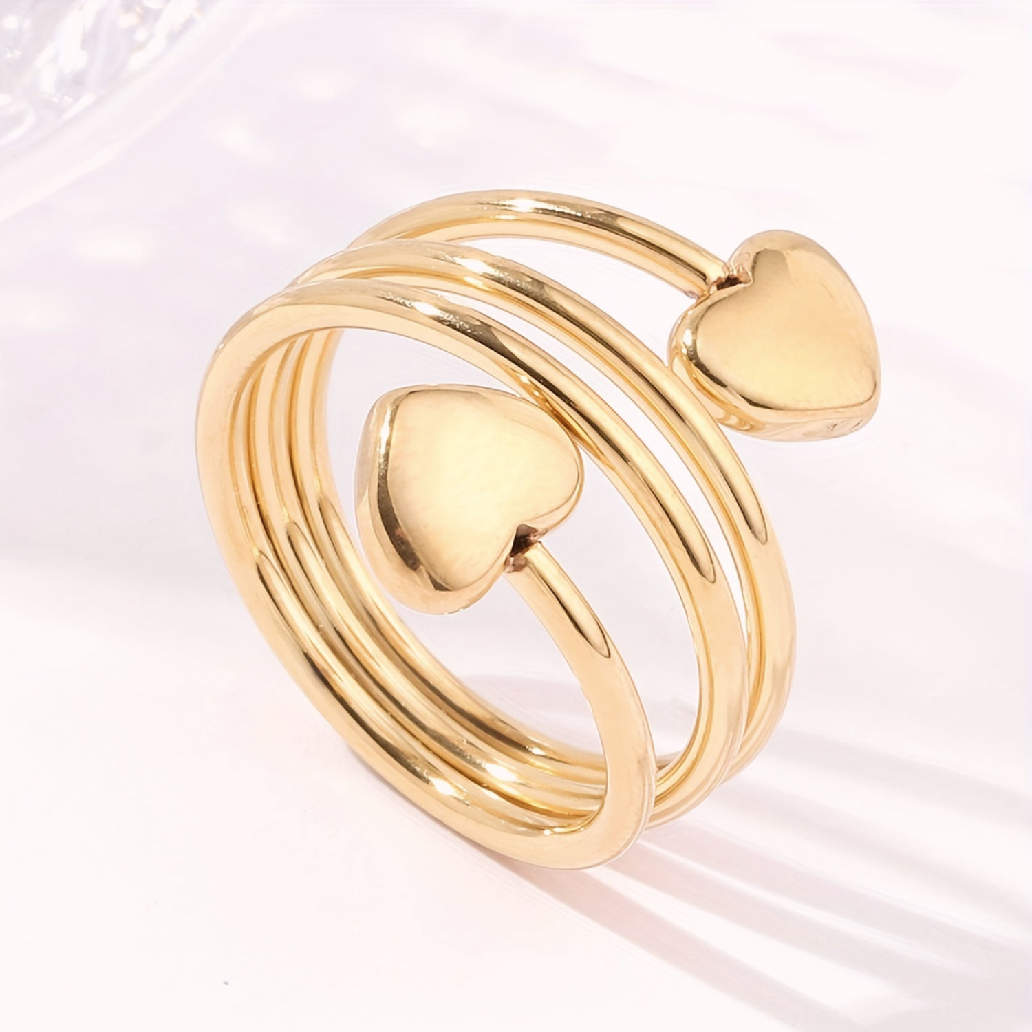 rvs gouden statement ring met hartjes verstelbaar van world's finest vooraanzicht