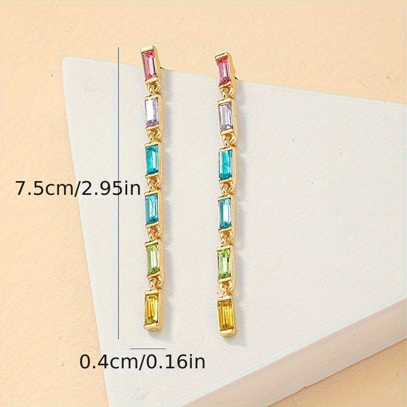 Thumbnail: Lune Drops | lange  oorbellen met steentjes