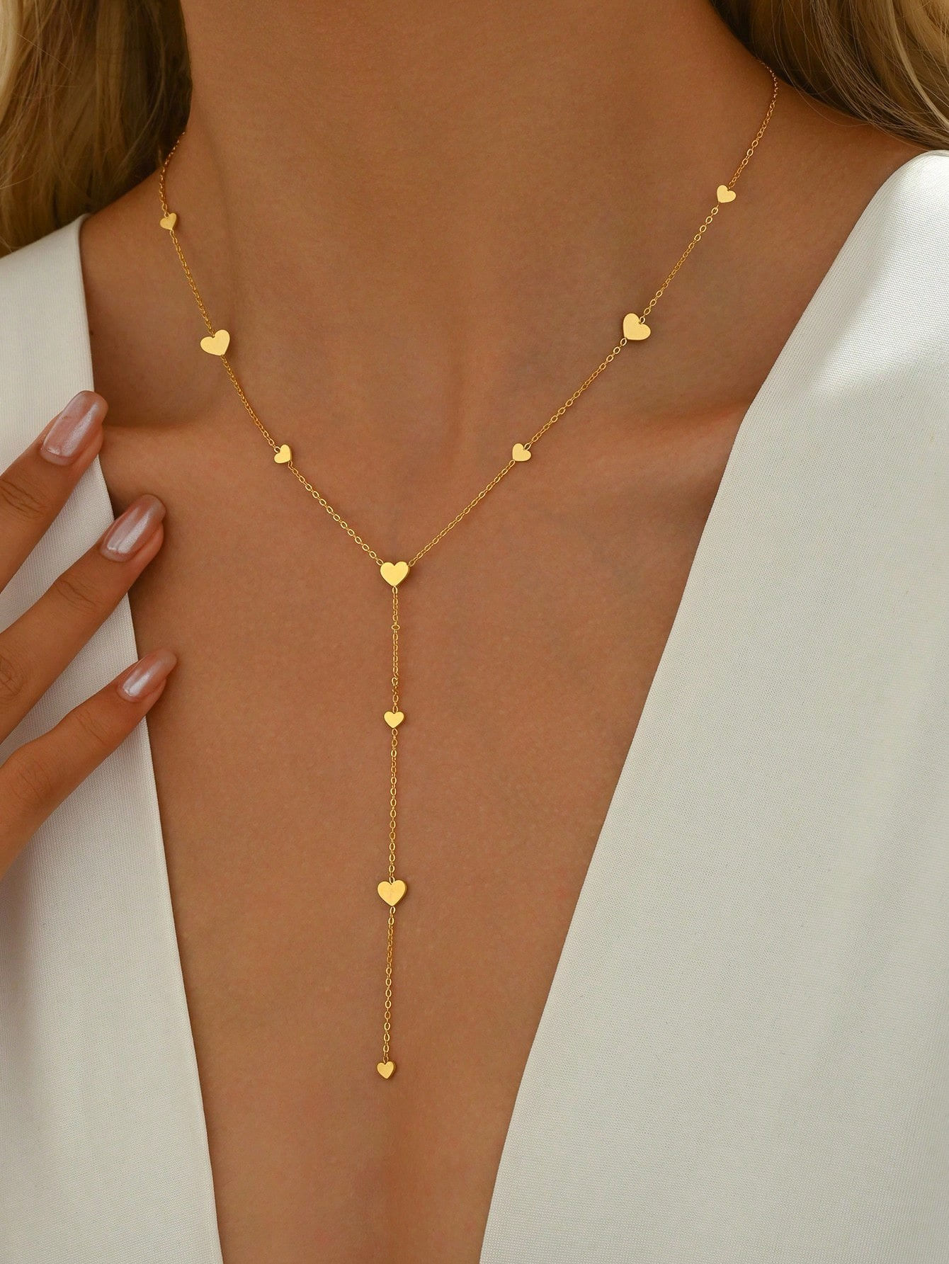 y ketting goud met hartjes van world's finest modelfoto 1