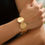 Thumbnail: Bangle Macy zwart en goud | brede armbanden