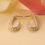 Thumbnail: hoops goud in u vorm met parels