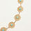 Thumbnail: riem ketting in goud met bloemen en steentjes blauw van world's finest detail foto