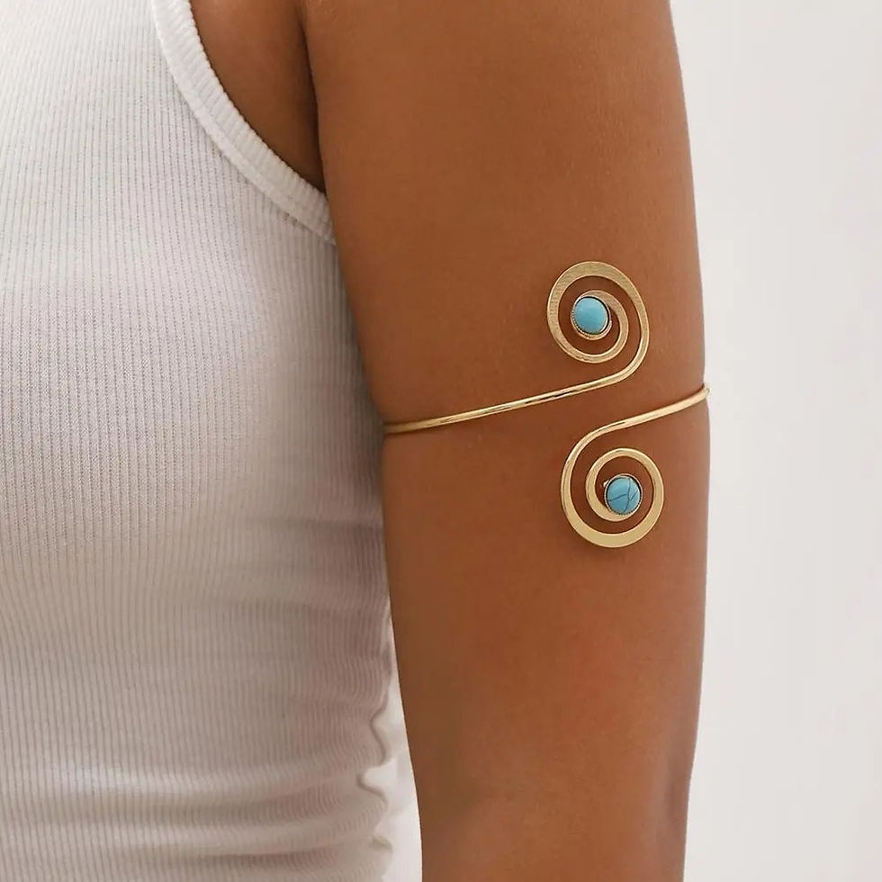 bovenarm armband goud met turquoise steentjes van world's finest modelfoto