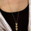 Thumbnail: modelfoto lange ketting goud elegant modern world's finest