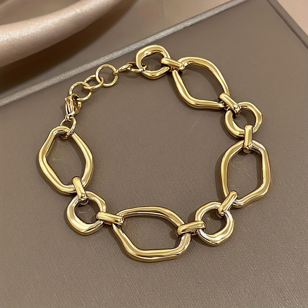 Thumbnail: schakelarmband met grote asymmetrische schakels goud world's finest bovenaanzicht