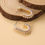 Thumbnail: hoops goud in u vorm met parels