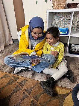 Two Children Reading.jpg