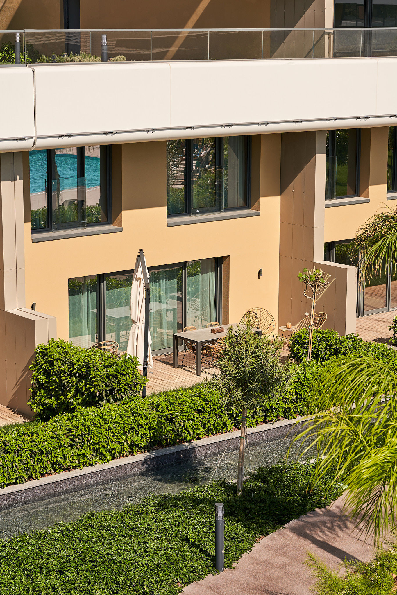 a building with a table and chairs in front of it