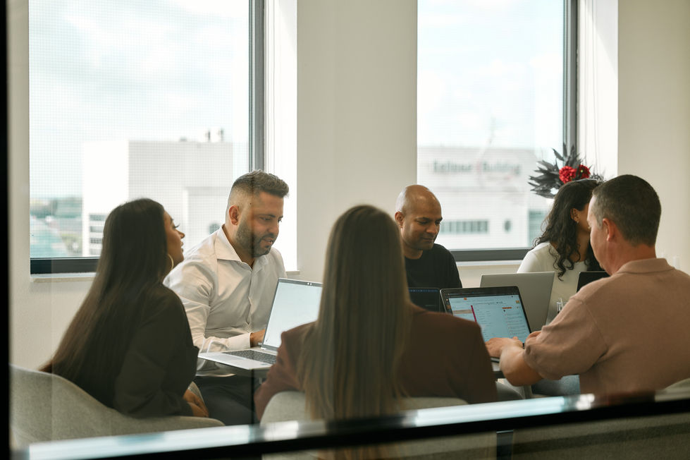 Group meeting in a modern office setting.