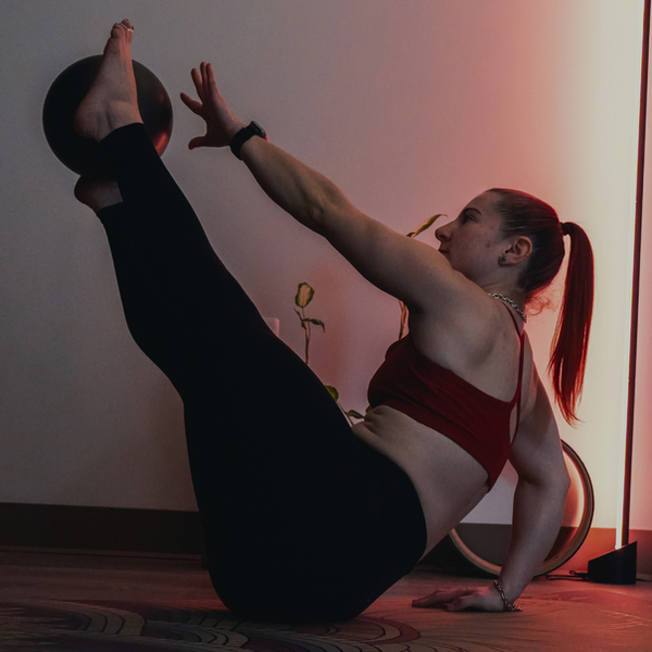Pilates ball on yoga mat used for Abate Core Method strength and mobility training