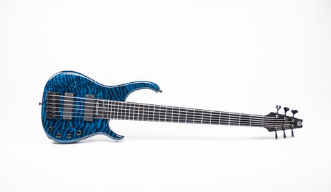 Blue electric guitar product photo.