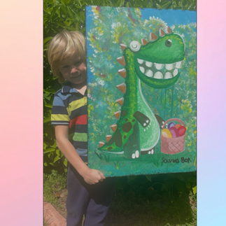Easter Challenge winners at LEO SCHOOL. A boy is holding an Easter poster with a dino on it