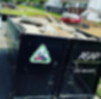 ASAP Dumpsters construction debris disposal Maryland dumpster filled with concrete and demolition debris at residential construction project.