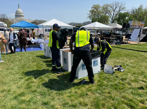 ASAP Waste Services crew performing professional event cleanup at the National Mall in Washington DC with the U.S. Capitol in the background