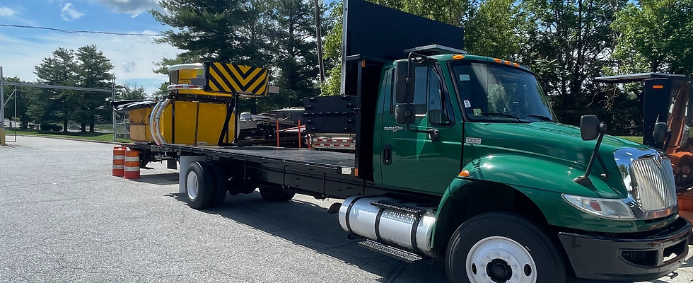 ASAP Traffic Control truck equipped with a TMA crash attenuator parked outdoors in Maryland, used for road safety, lane closures, and infrastructure maintenance support.
