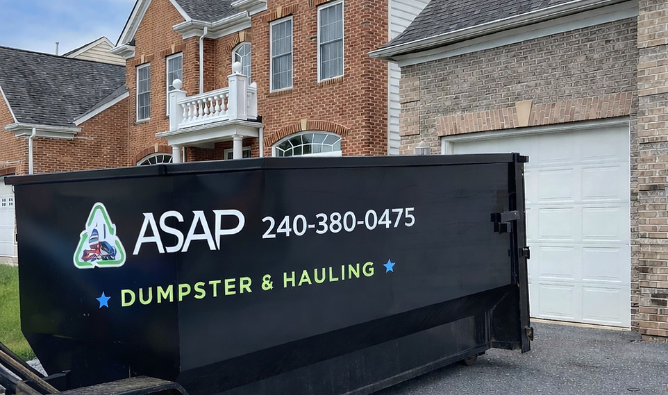 ASAP Dumpsters roll-off dumpster rental placed in a residential driveway in Essex, Maryland for home cleanout and renovation debris.