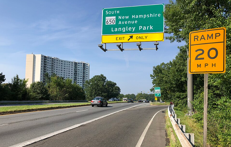 Langley Park exit sign off New Hampshire Avenue, representing Junkman Removal & Disposal Services availability in this urban community.