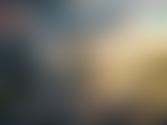 A high-contrast photo of a three-way road fork in a futuristic landscape, with one path glowing with golden light.