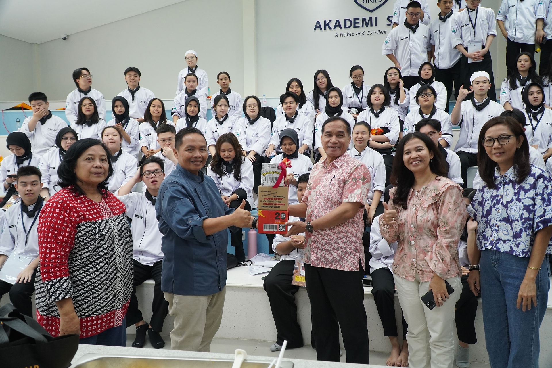 New students of Sages Academy wearing chef uniforms participate in the One-Week New Student Orientation Program, building teamwork and campus spirit.