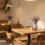 Cozy cafe interior with warm seating and welcoming atmosphere
