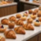 Fresh baked pastries displayed at a cozy cafe and bakery