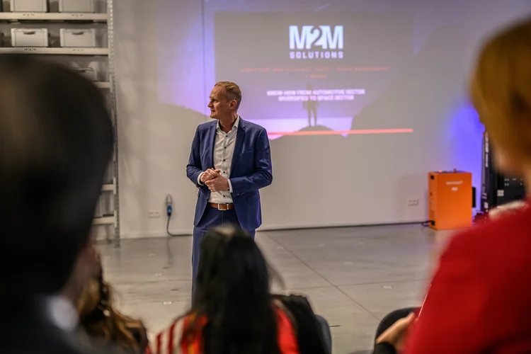 Matin Jančo presents in the showroom.