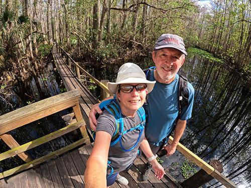 Walking on the Cypress Trail at Highlands Hammock State Park in Sebring, Florida.