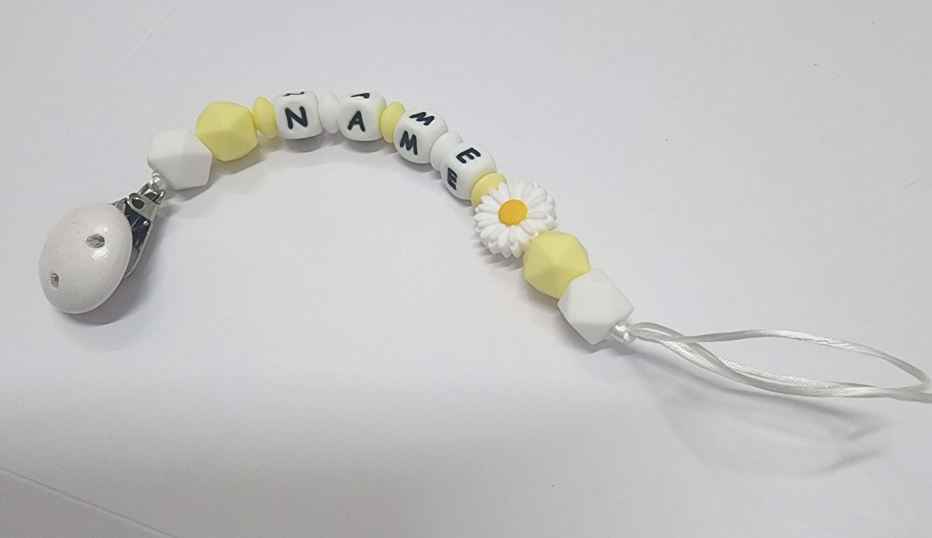 מחזיק מוצץ פרח לבן צהוב