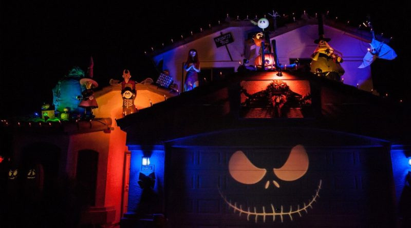 <img src="orange and purple lights.png" alt="Spooky halloween theme using purple and orange christmas lights">