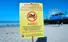 Sign on California Beach Warning People About Dangerous Bacteria Level In Water