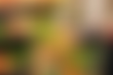 AI Image of Person Pushing Shopping Cart Full of Produce in a Supermarket
