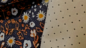 Quilting blender fabric paired with floral print showing contrast and balance in a quilt