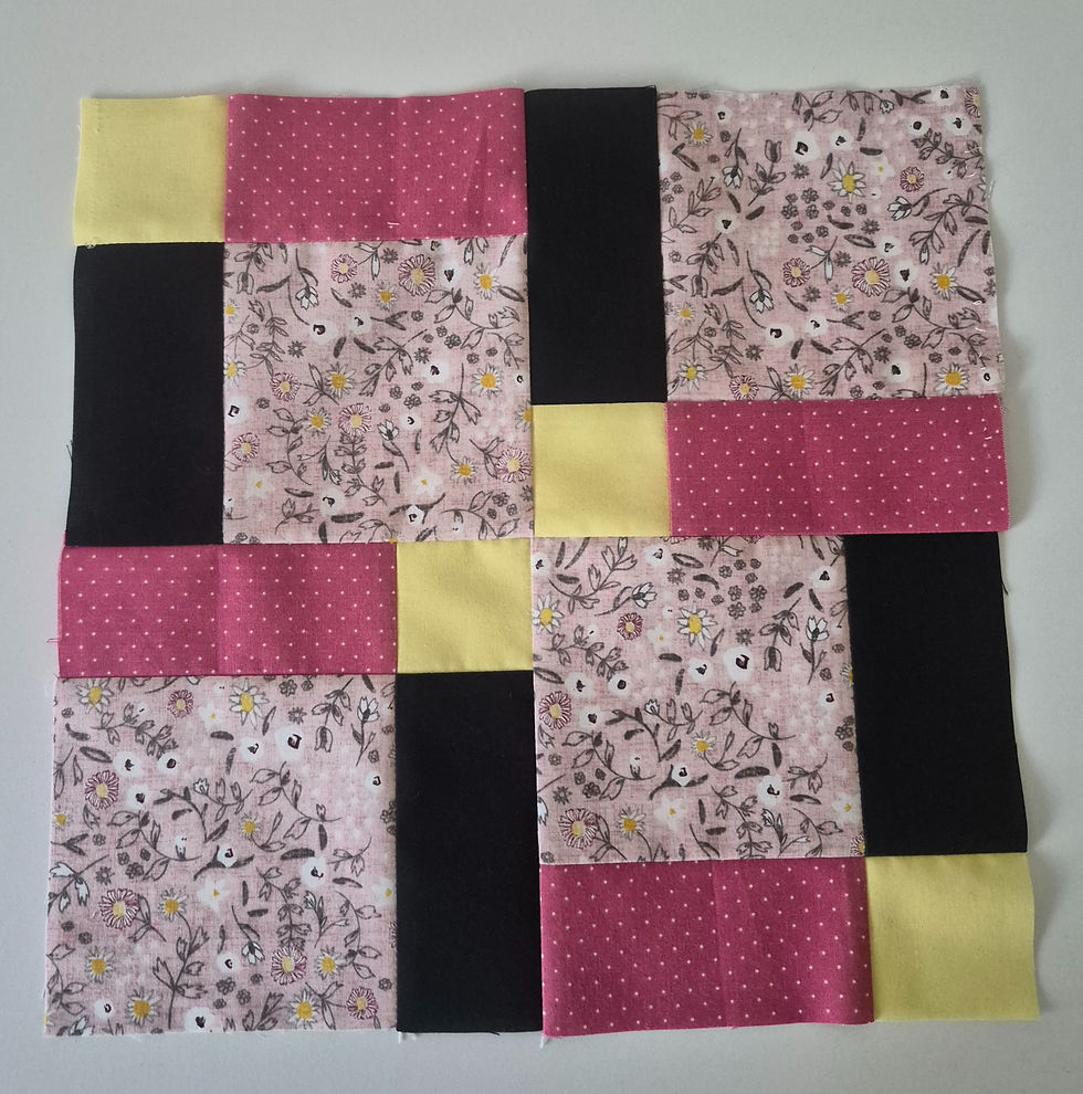 The same fabrics, a few simple units, and suddenly it starts to feel like a quilt instead of just a fabric pull.