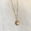 Miniature : Collier médaille doré