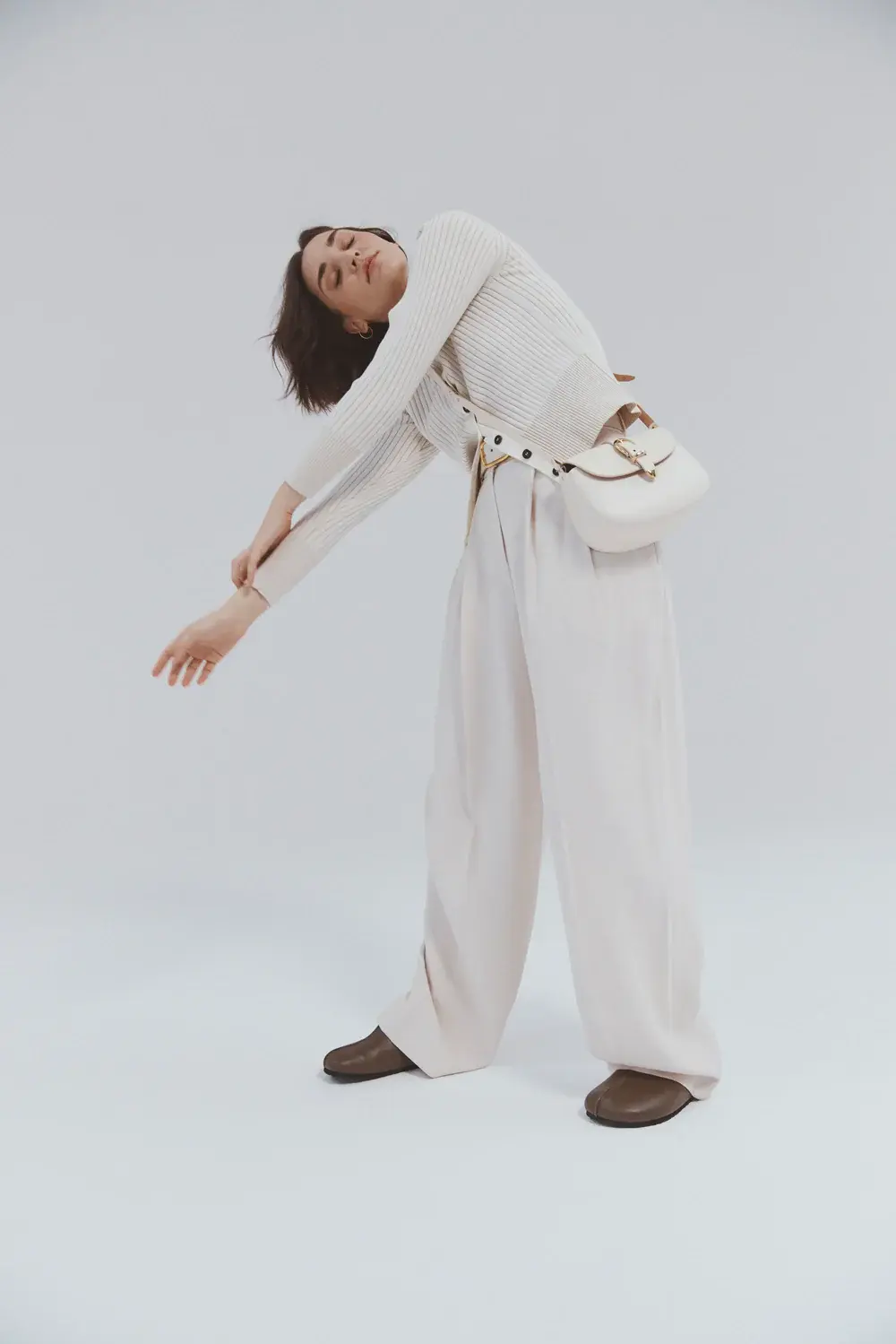 Sac à main crème porté