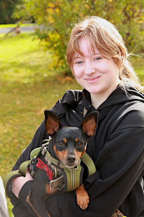 girl with small dog
