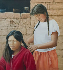 PEINANDO A SU HERMANA