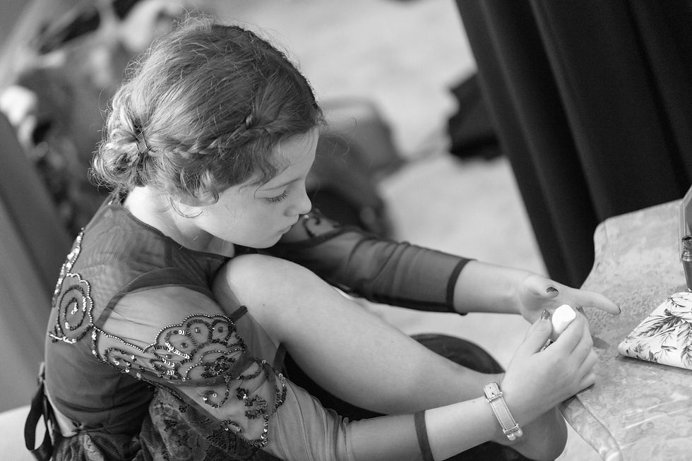 Black & white photo of the flower girl