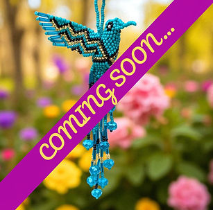 Hand beaded teal colour hummingbird