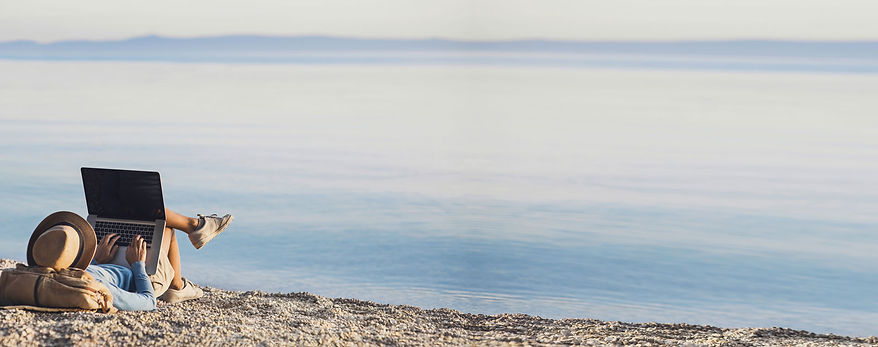 man on the beach contacting Michele Gogliucci, LCSW to book a free consultation for online therapy in Florida