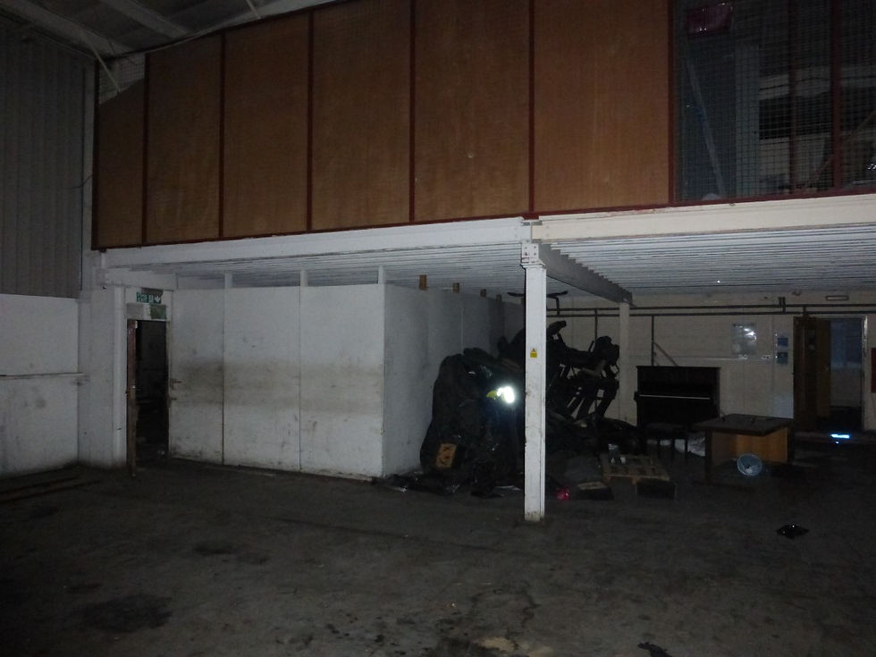 mezzanine floor with office to be dissembled and removed.
