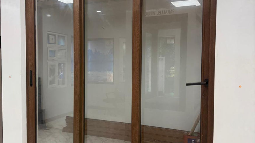 Wooden color UPVC Three Track Door