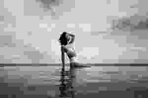 Woman in bikini and retro sunglasses
