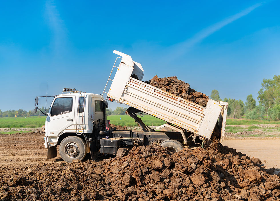 tipper-truck-discharging-full-load-raw-earth-clay-civil-engineering-site (1).jpg
