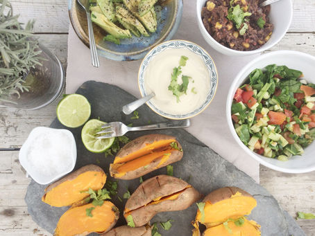 BAKED SWEET POTATO WITH FRIED BLACK BEANS & CASHEW SOUR CREAM