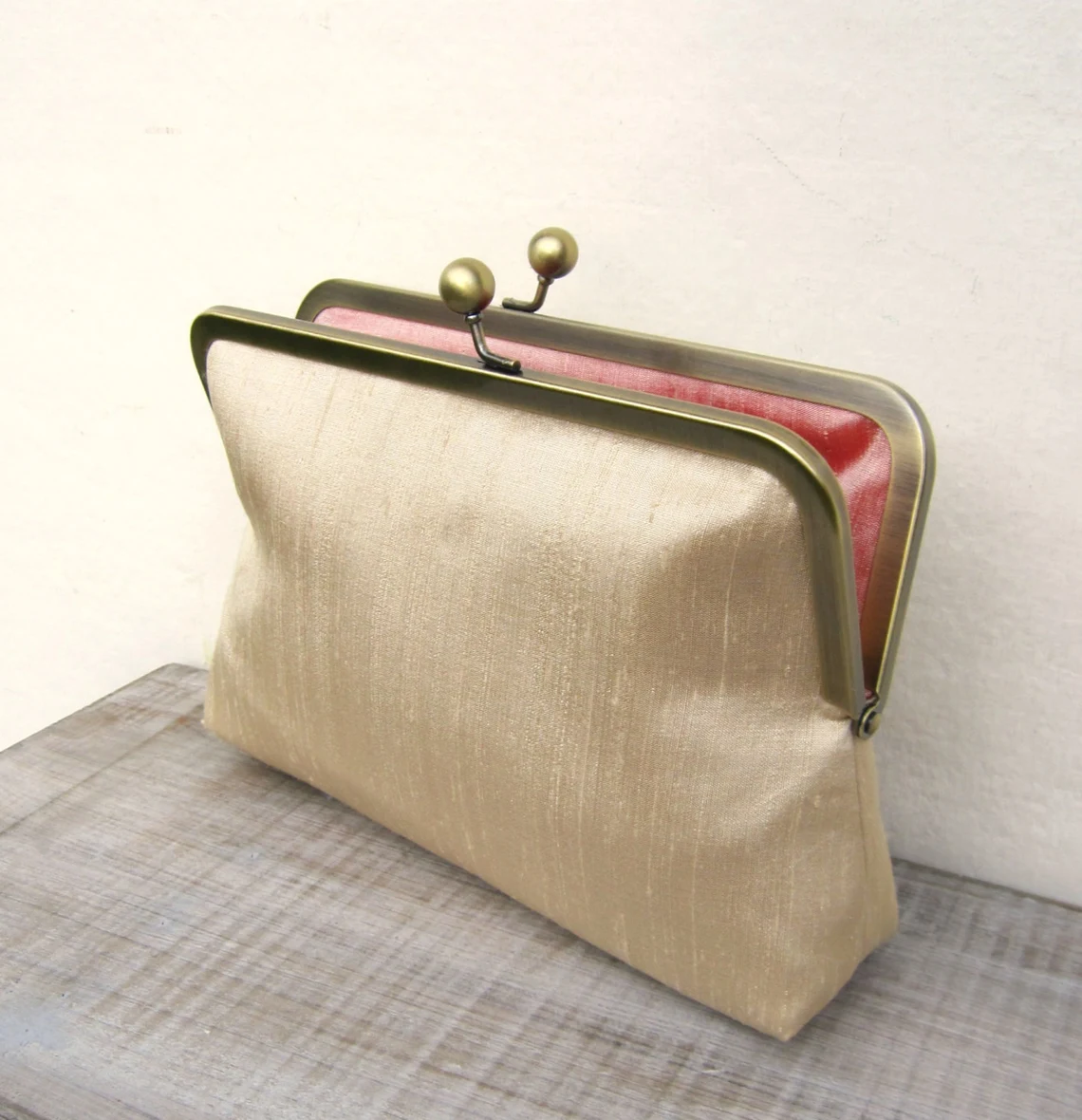 Gold silk clutch bag