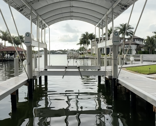 Front view of a Coastal DCS boat lift with a canopy