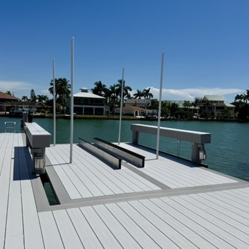 Jet ski platform lift with a deck surface matching the adjacent dock
